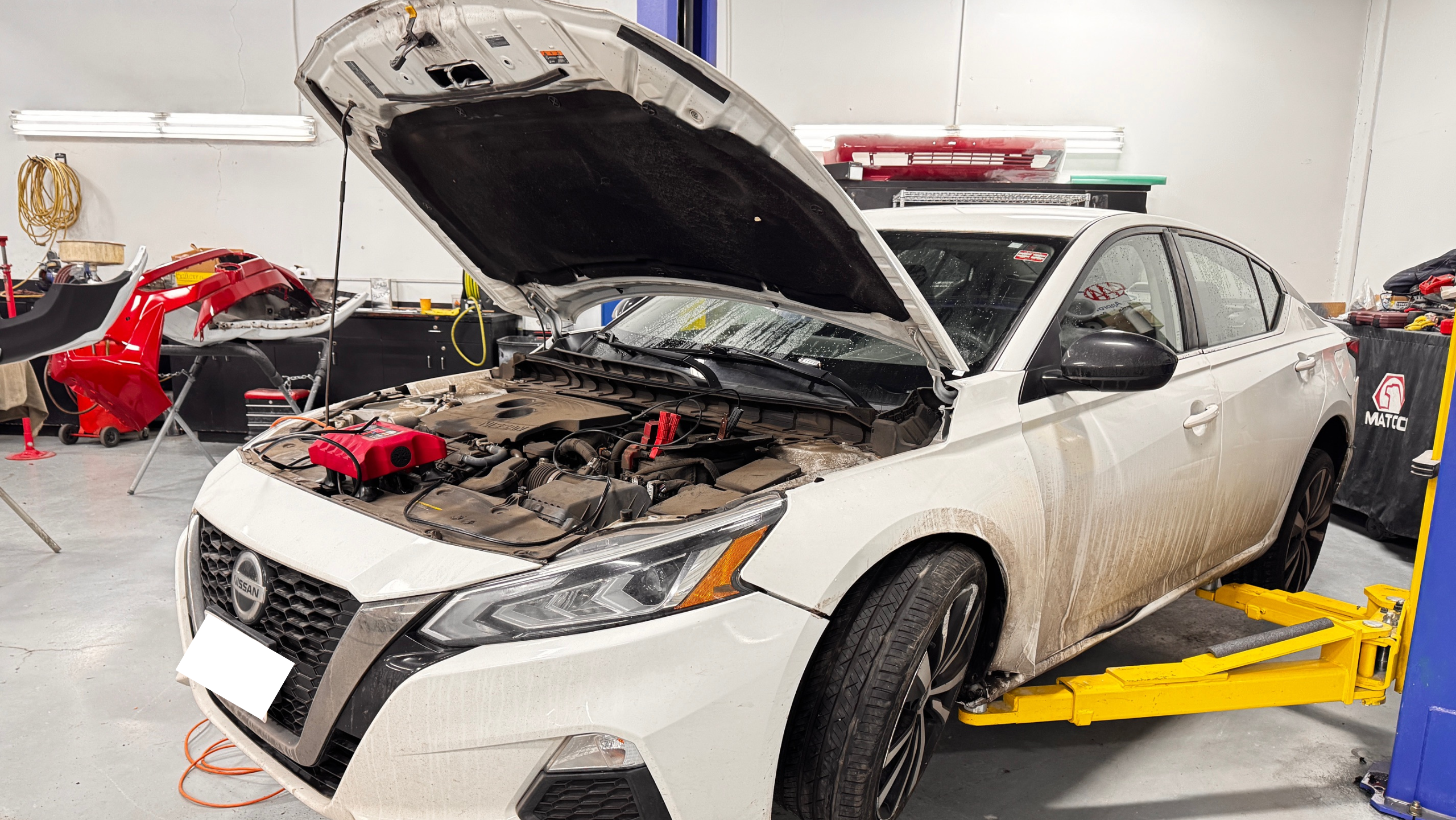 Crown crew members prepping a customer vehicle for collision repair work